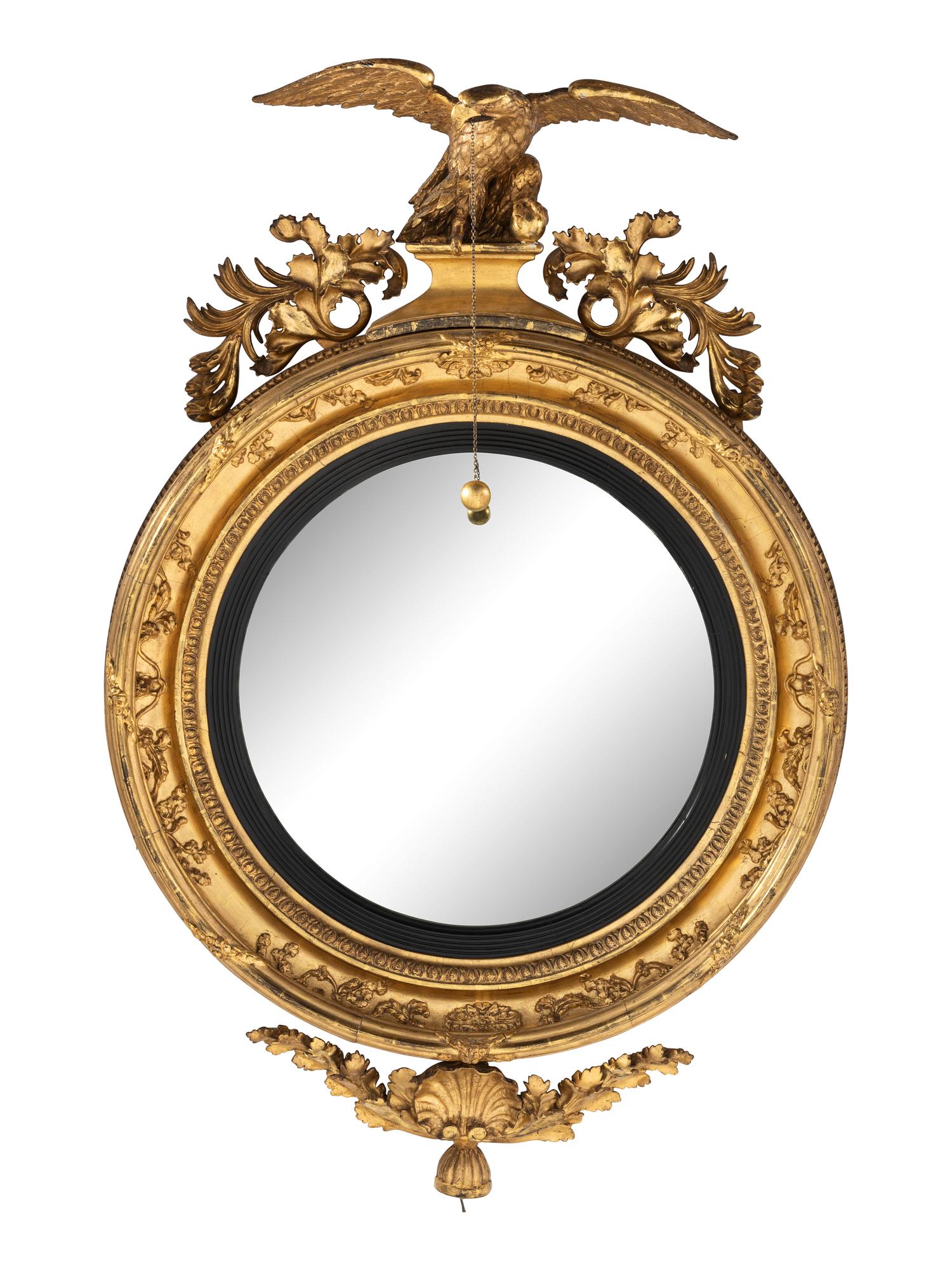 A Large Federal Carved Giltwood and Gesso Bull's-Eye Looking Glass