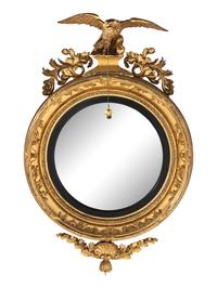 A Large Federal Carved Giltwood and Gesso Bull's-Eye Looking Glass