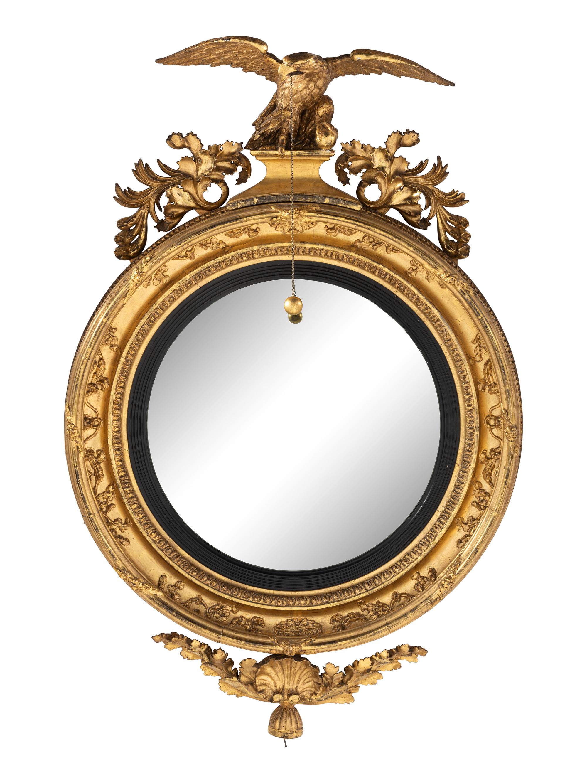 A Large Federal Carved Giltwood and Gesso Bull's-Eye Looking Glass