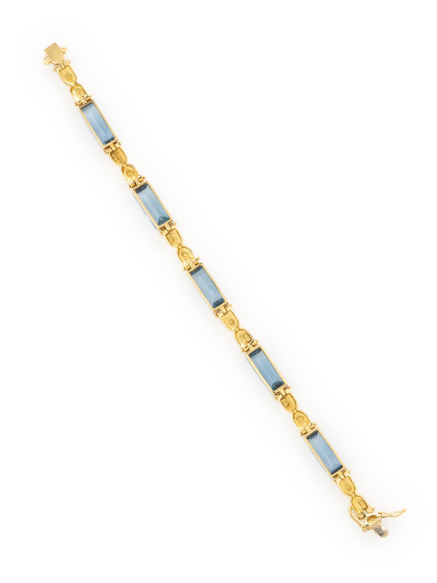 YELLOW GOLD AND SYNTHETIC BLUE SPINEL BRACELET