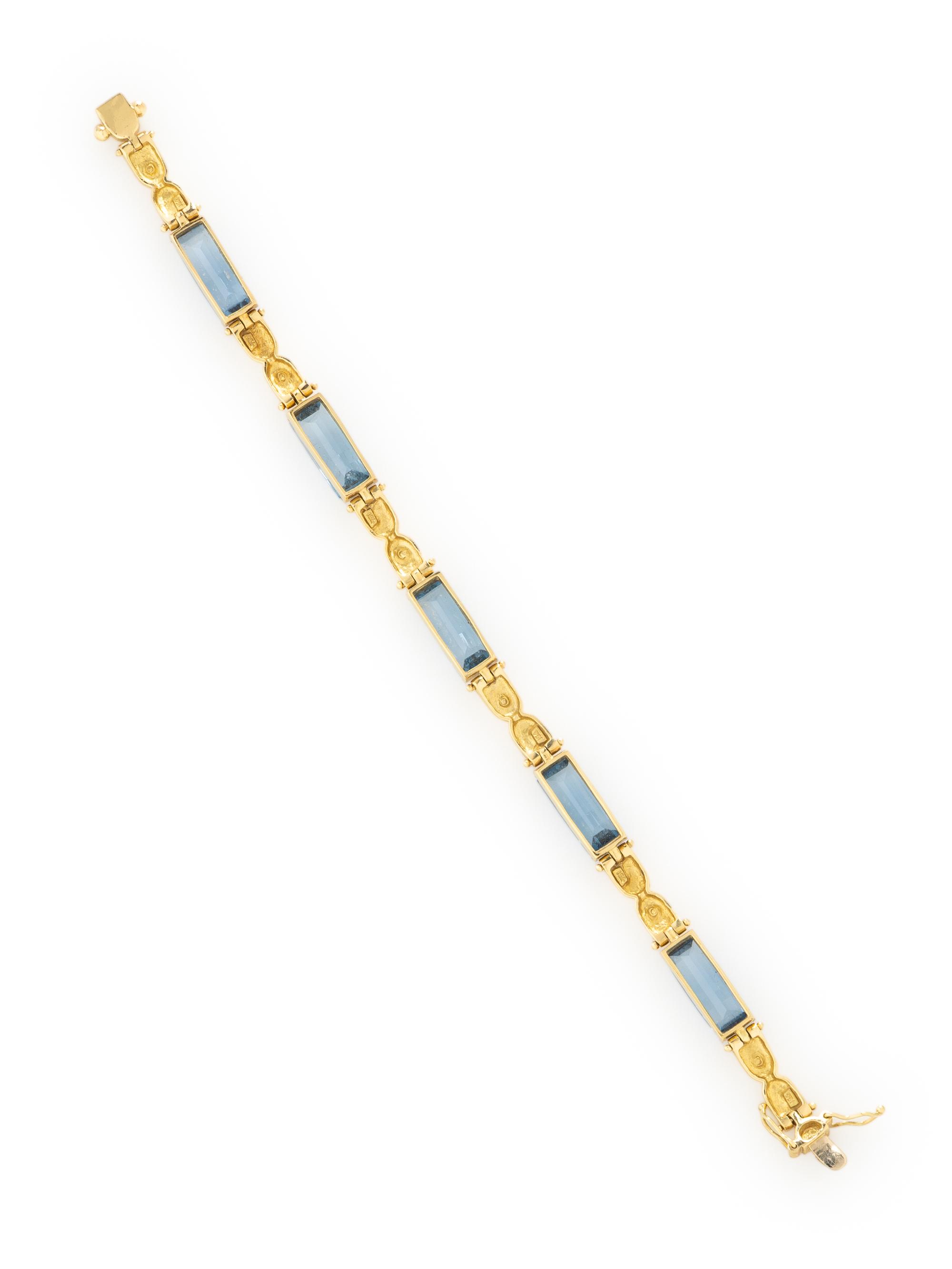YELLOW GOLD AND SYNTHETIC BLUE SPINEL BRACELET