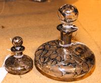 Two Silver Overlay Glass Bottles Height of taller 4 3/4 inches. — EARLY 20TH CENTURY