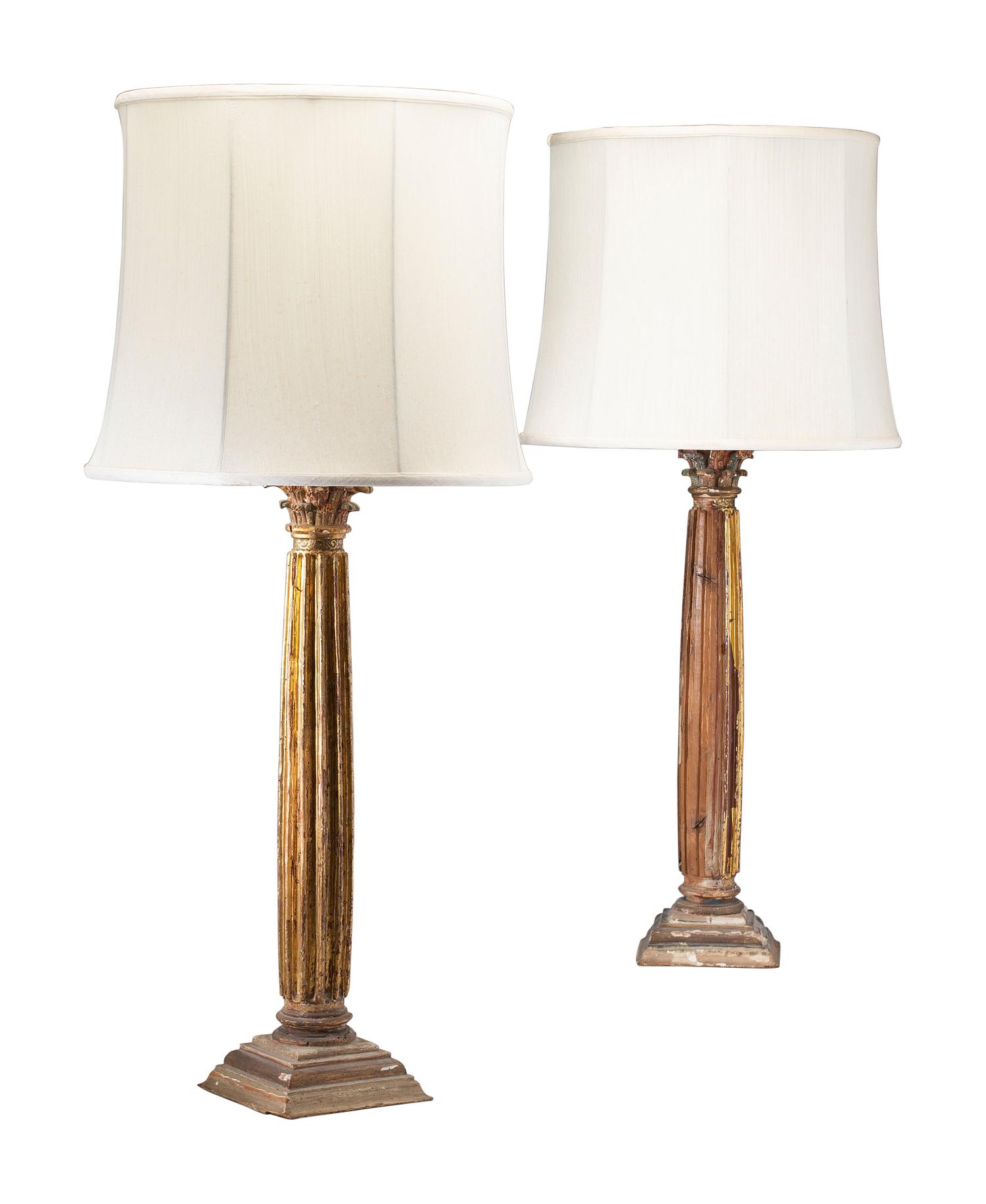 A Pair of Italian Carved and Parcel-Gilt Columnar Lamps