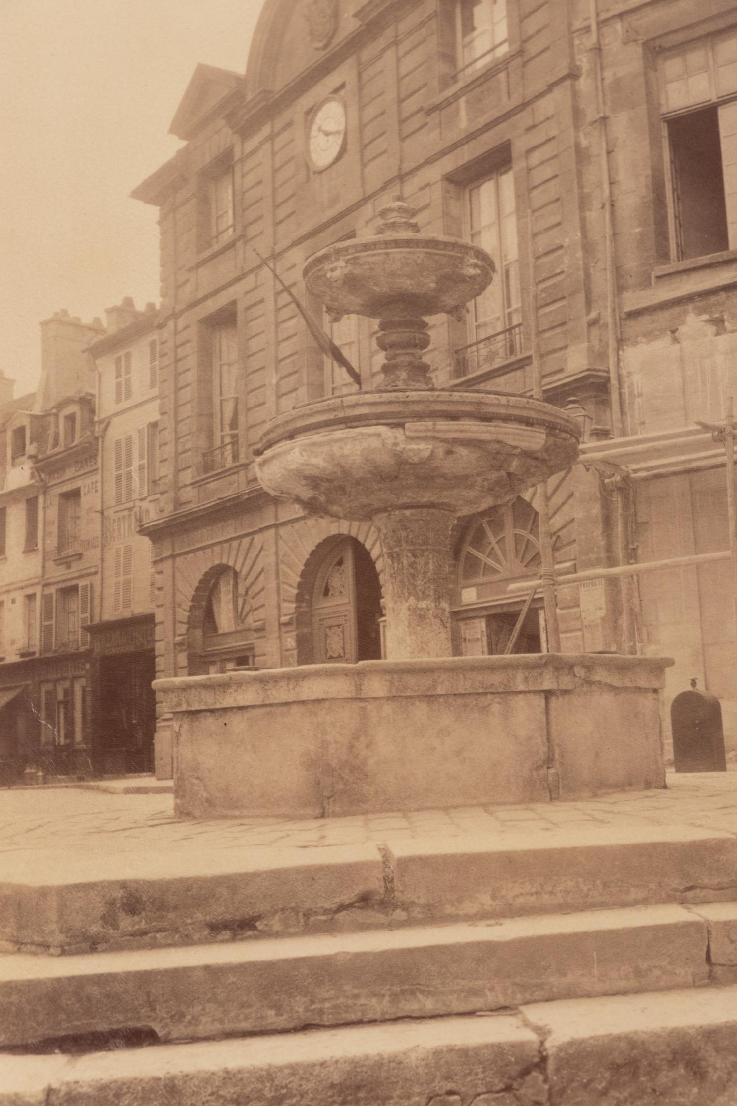 A pair of photographs depicting fountains ( Nantes - fontaine et Mairie, 1907; Provins ([vielle] fontaine [gothique]) , 1923)