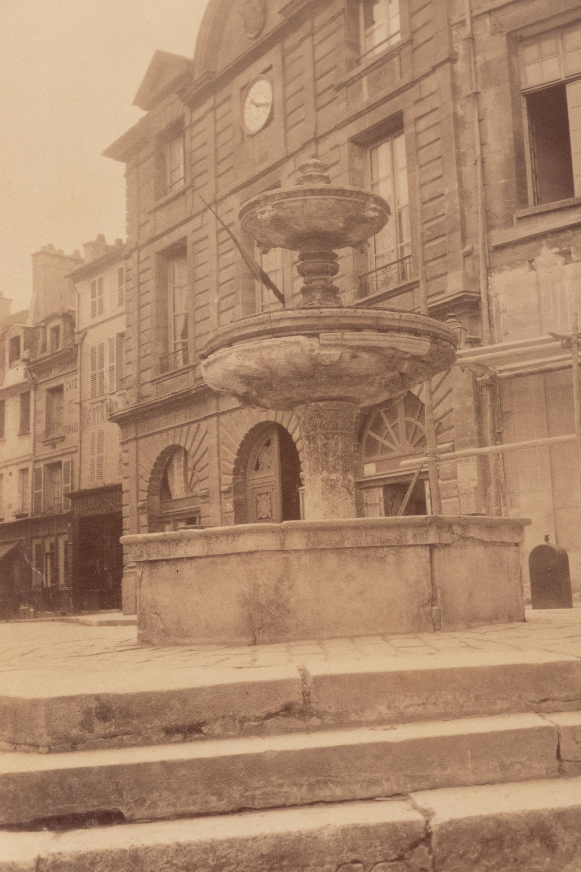 A pair of photographs depicting fountains ( Nantes - fontaine et Mairie, 1907; Provins ([vielle] fontaine [gothique]) , 1923)