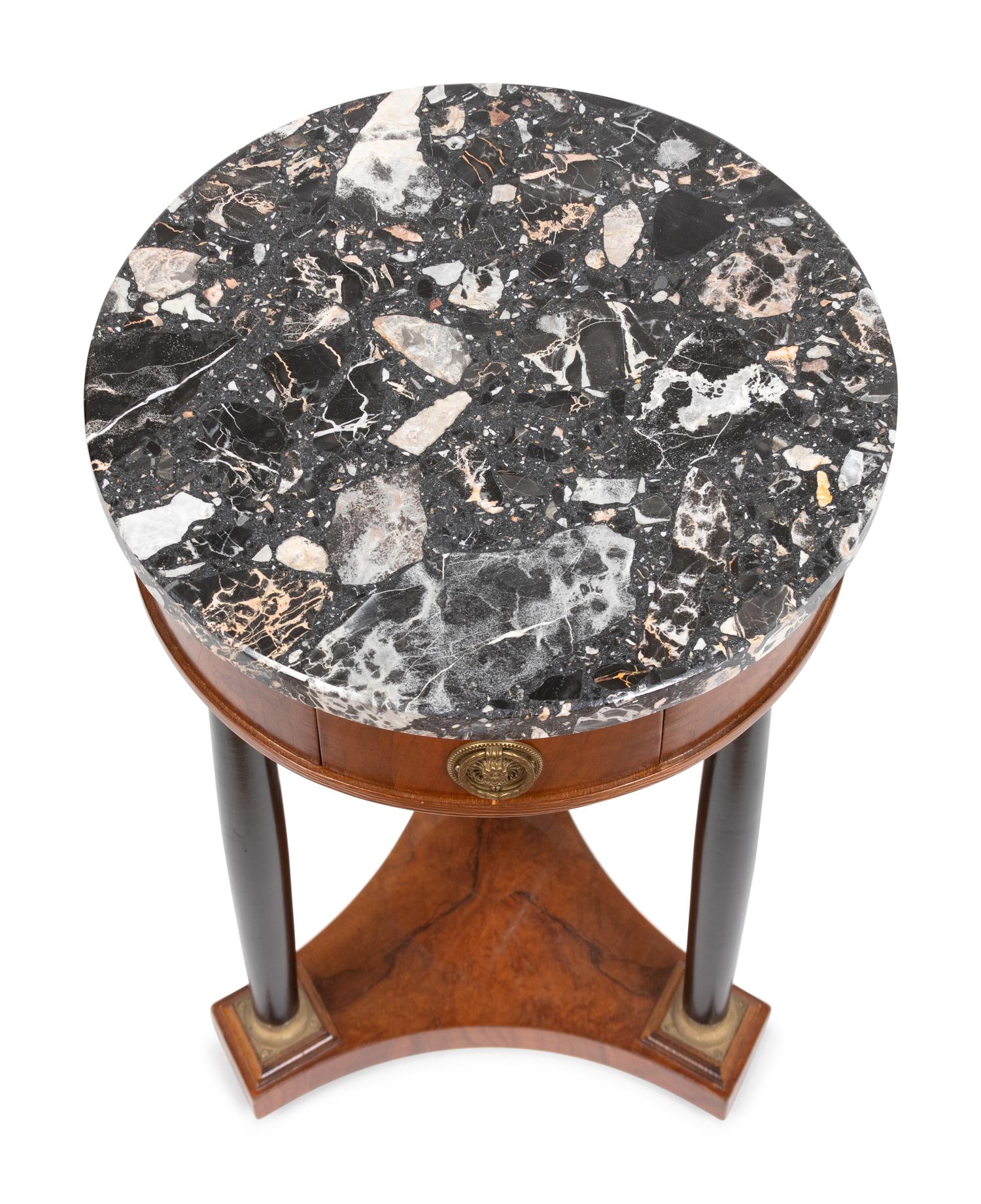 An Empire Style Part Ebonized Walnut Guéridon
