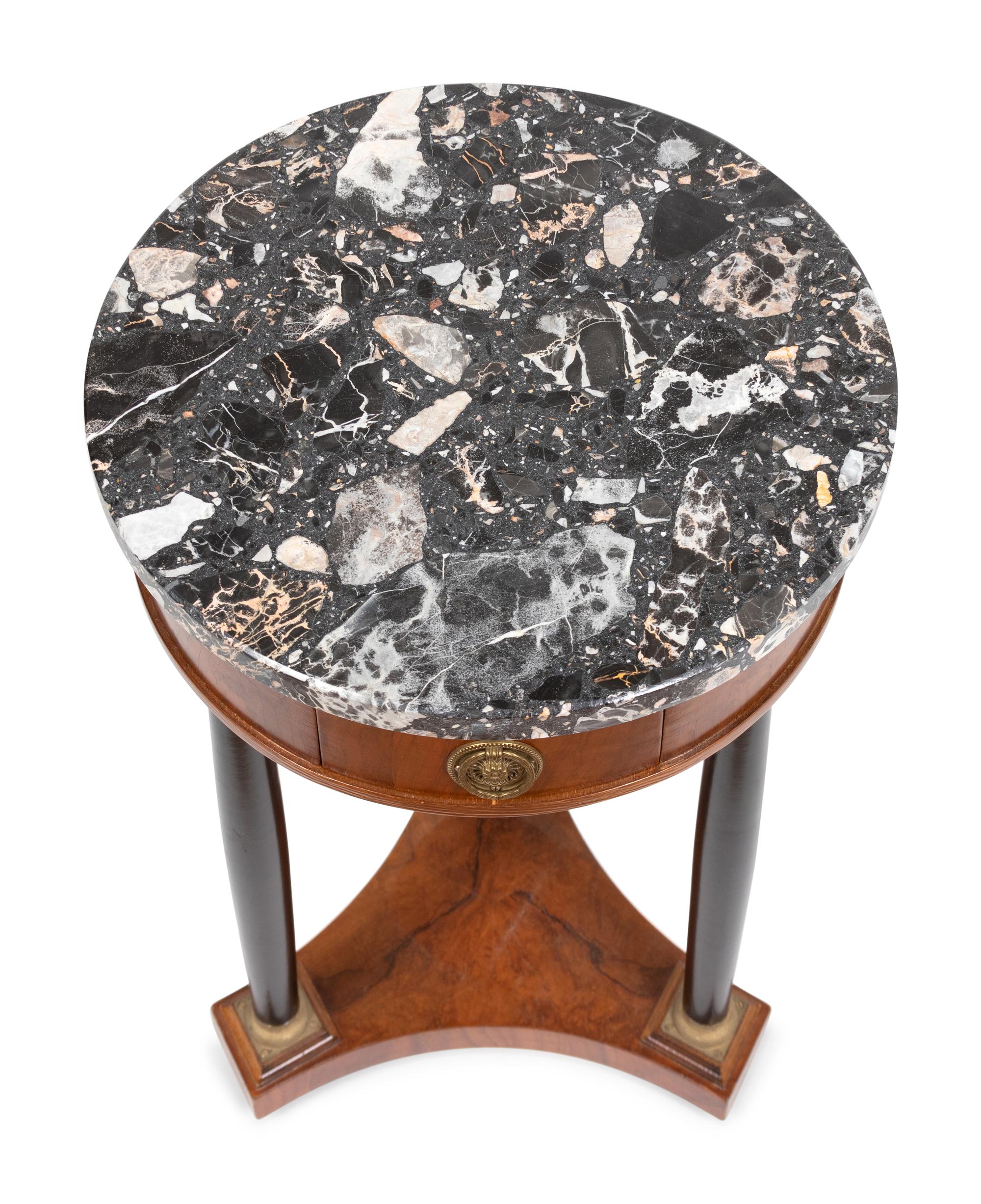 An Empire Style Part Ebonized Walnut Guéridon
