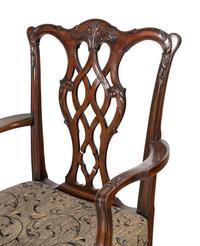 A Pair of George III Style Carved Mahogany Armchairs