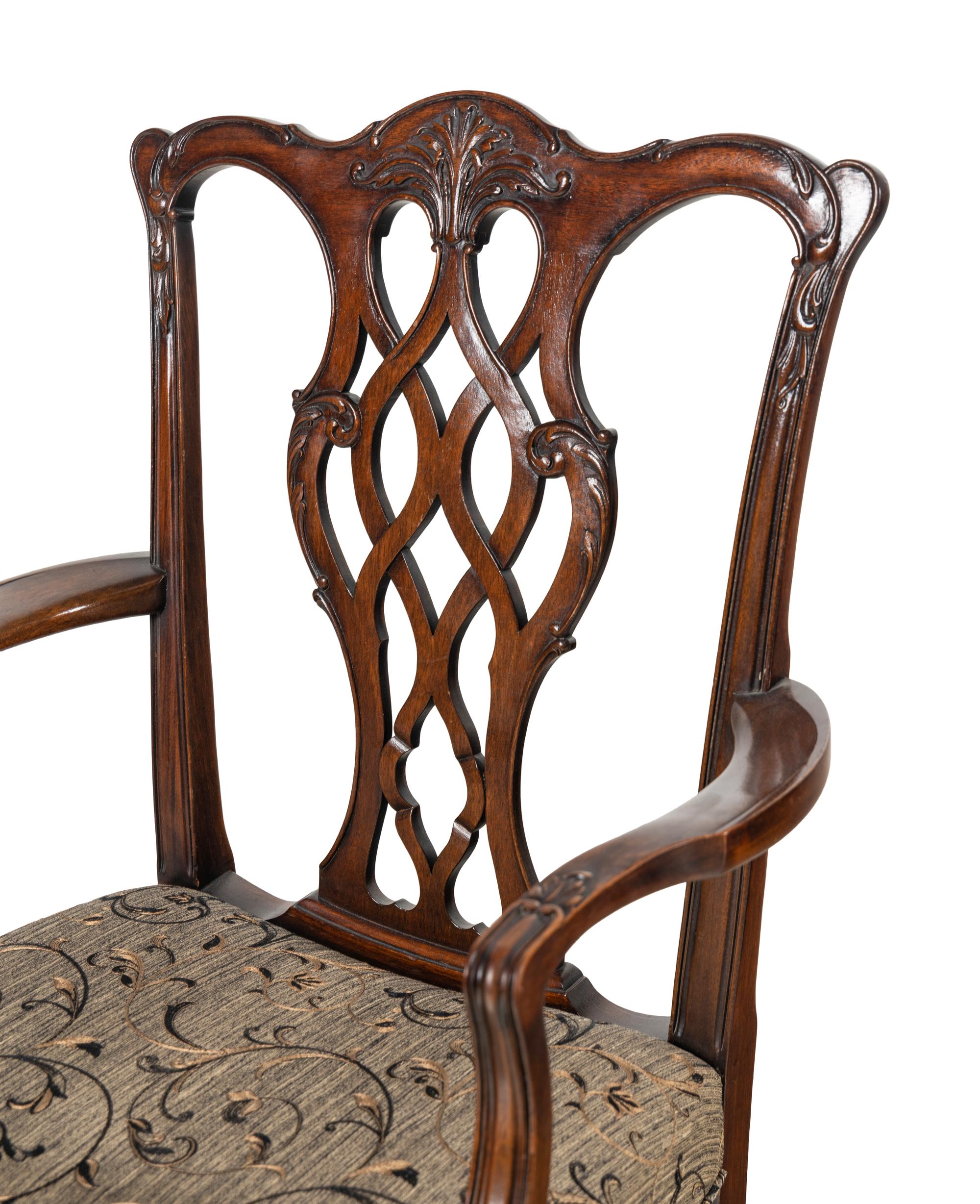A Pair of George III Style Carved Mahogany Armchairs