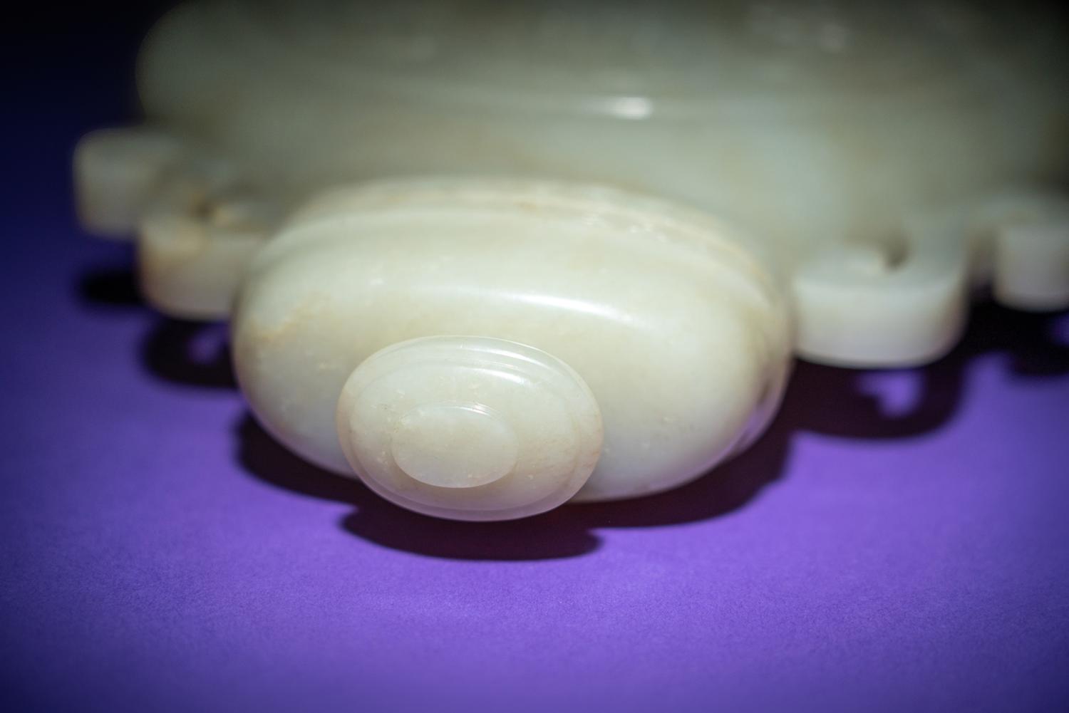 A Rare and Finely Carved Chinese White Jade Covered Vase