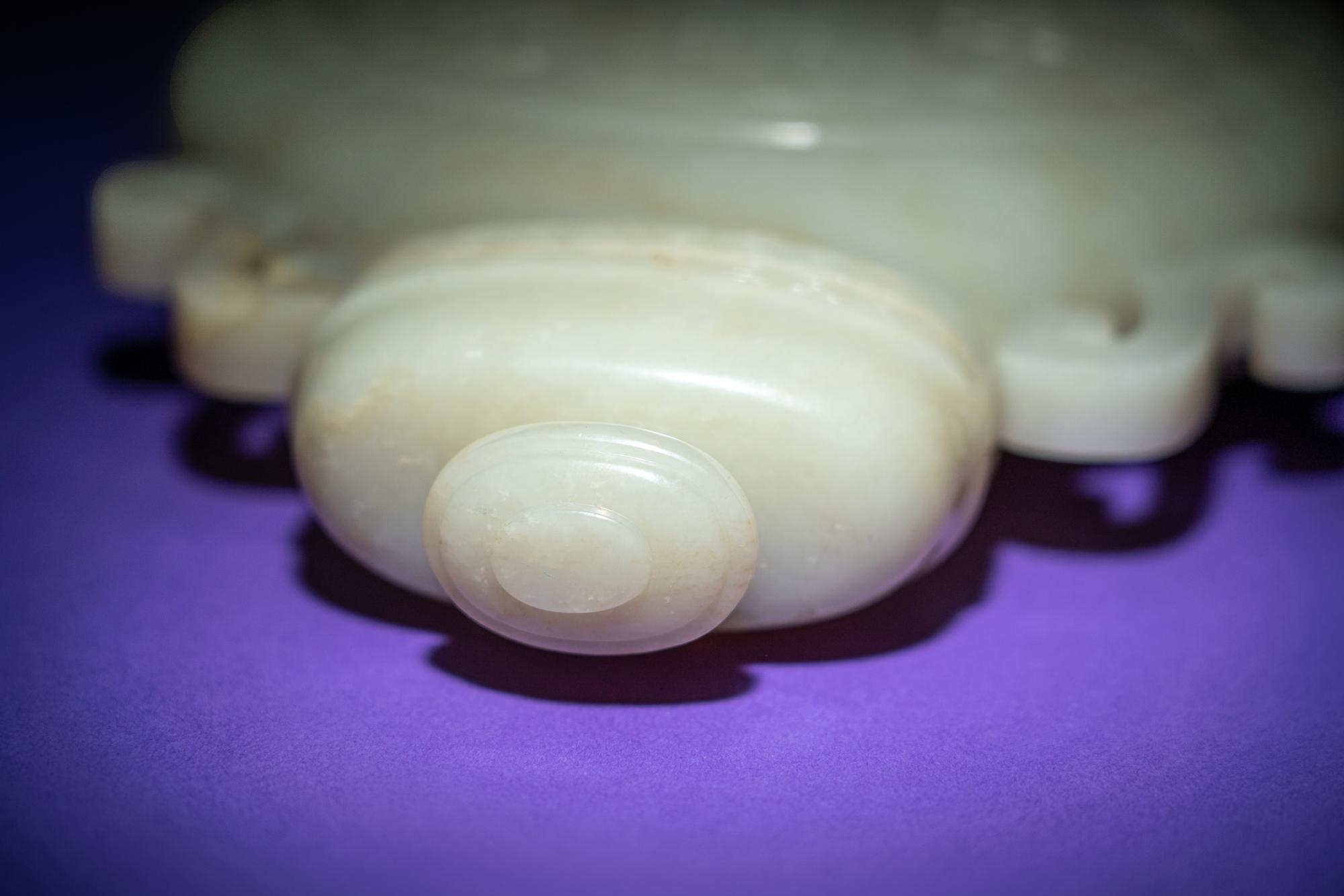 A Rare and Finely Carved Chinese White Jade Covered Vase