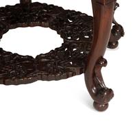 A Chinese Carved Hardwood Center Table and Four Matching Low Stools/Pedestals
