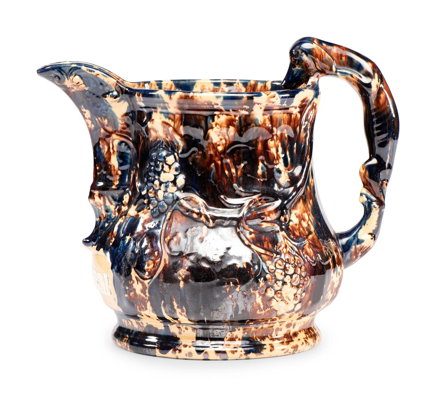 A Large Yellowware Pitcher with Spectacular Blue Flint Enamel Glaze