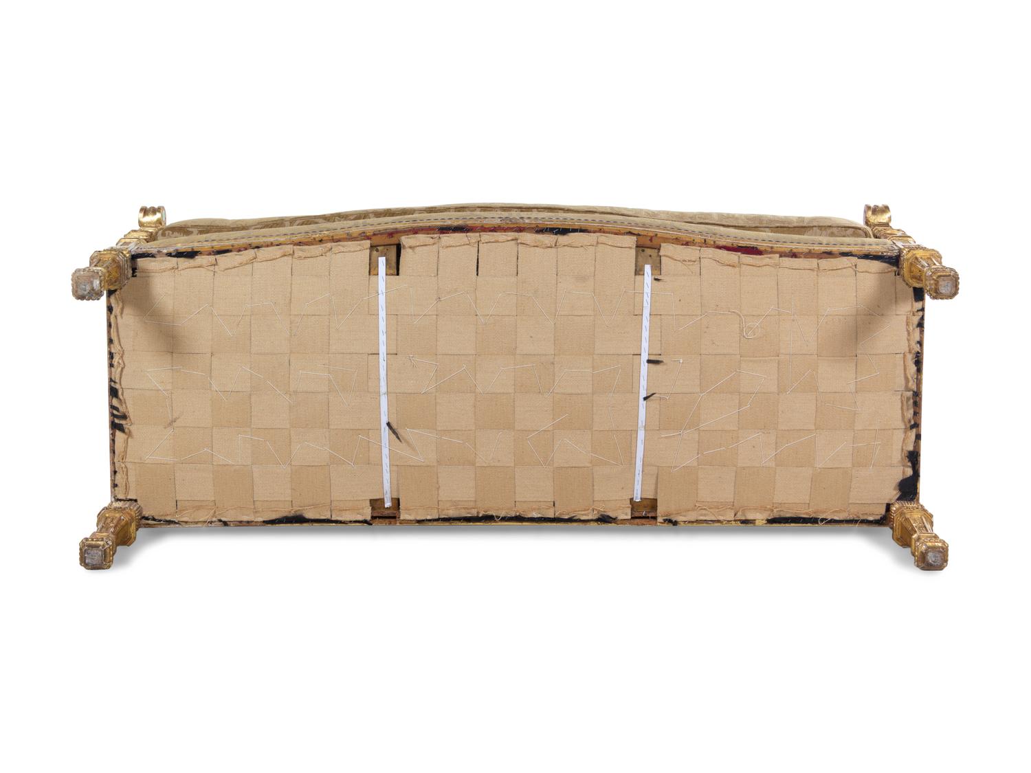 A Pair of Régence Style Carved Giltwood Sofas