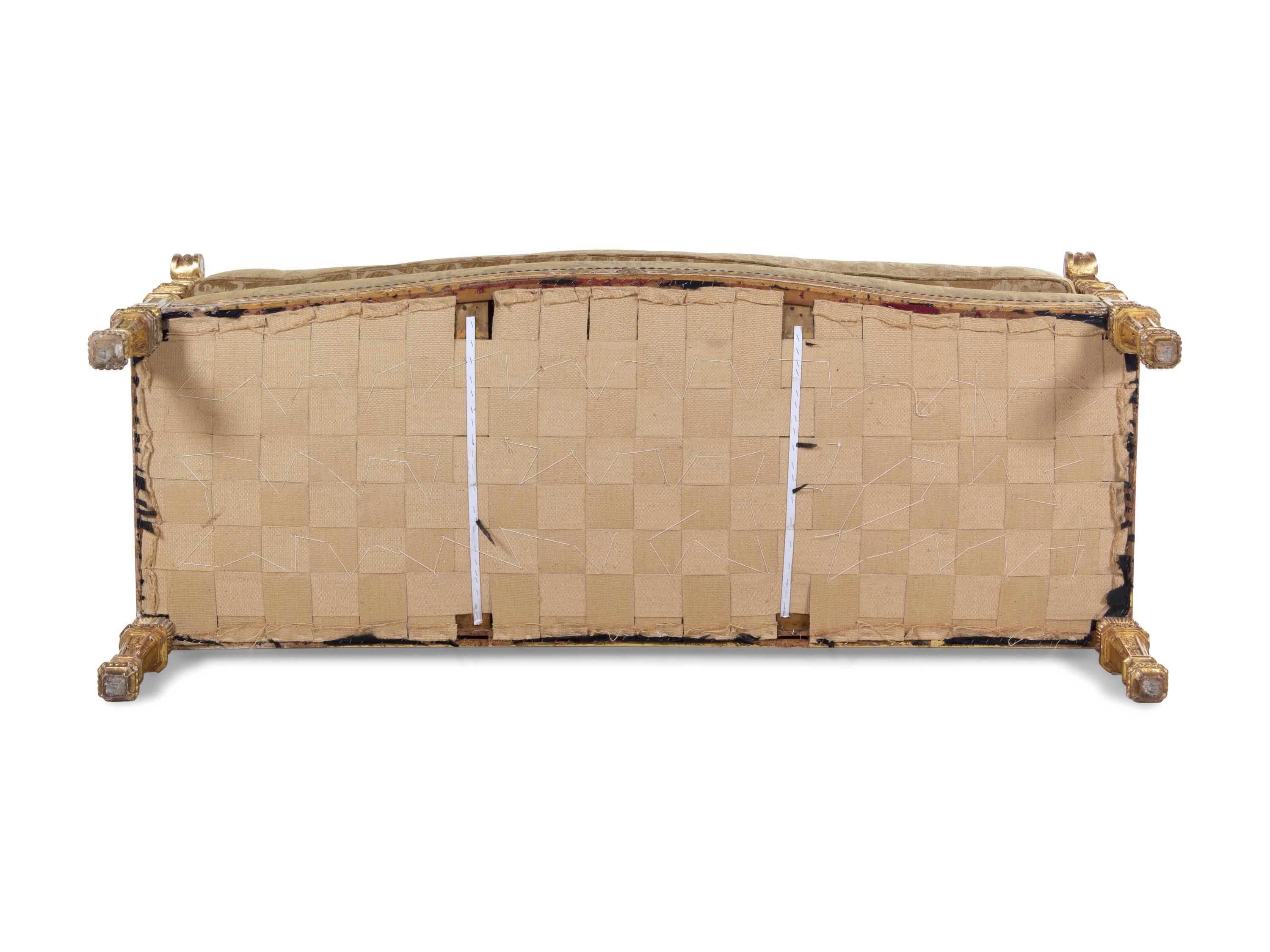 A Pair of Régence Style Carved Giltwood Sofas