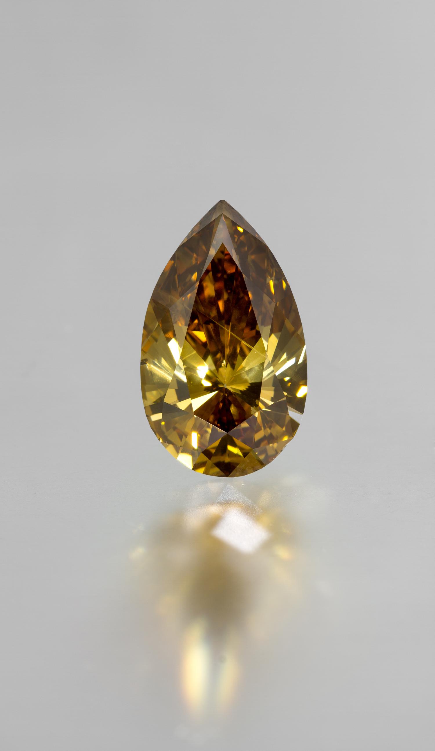A Platinum, Fancy Deep Brown Yellow Diamond and Diamond Ring/Pendant, 13.60 dwts.