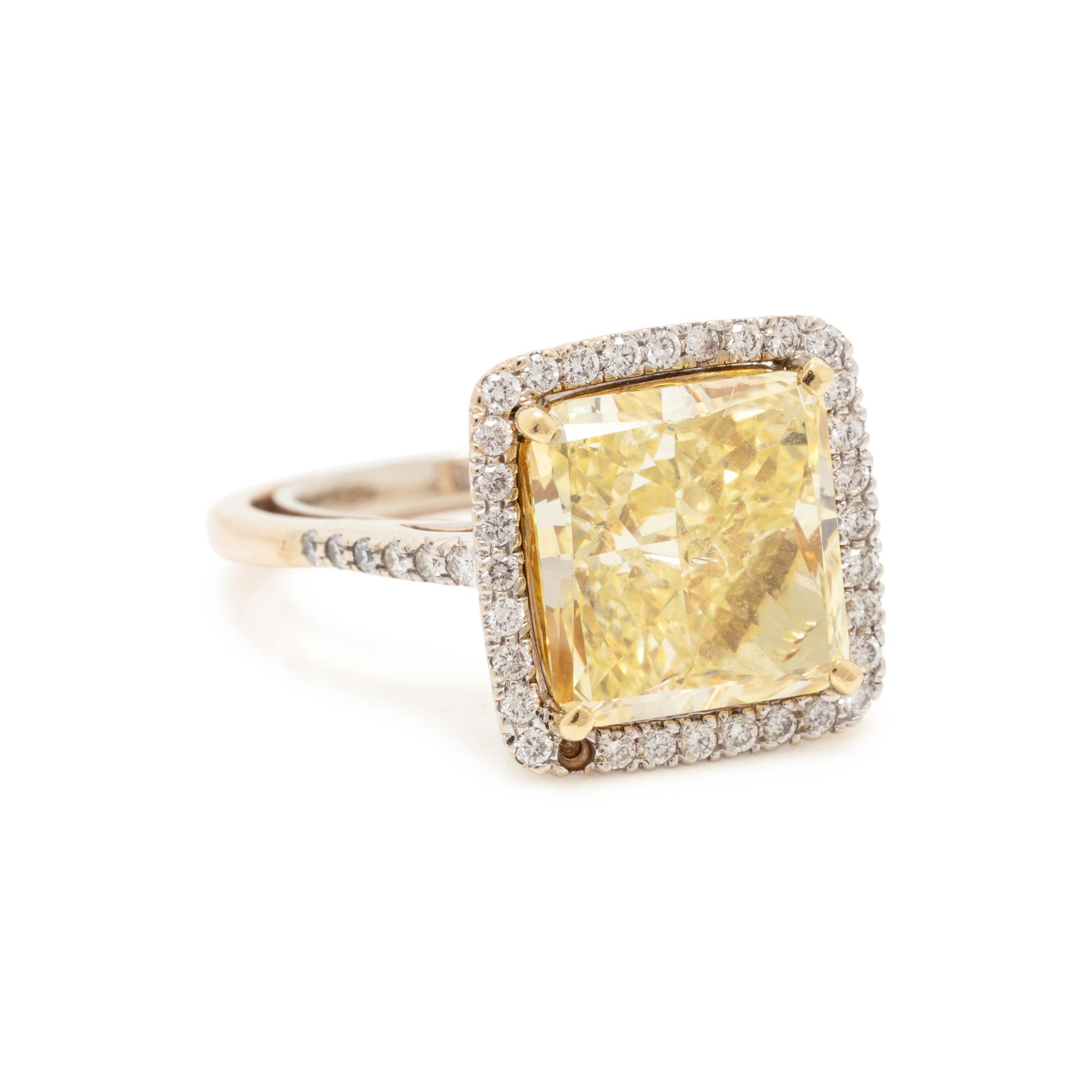 FANCY INTENSE YELLOW DIAMOND AND DIAMOND RING
