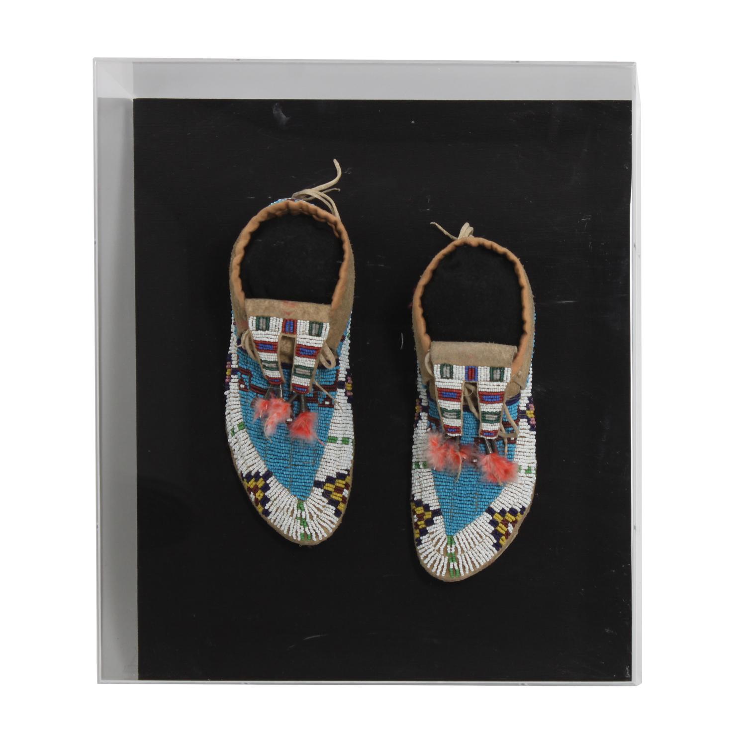 A Pair of Sioux Mocassins Lelngth 8 1/2 inches — CIRCA 1900