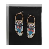 A Pair of Sioux Mocassins Lelngth 8 1/2 inches — CIRCA 1900