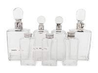Seven Silver and Silver-Plate Mounted Glass Decanters