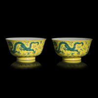 A Pair of Chinese Green Enameled Yellow Ground 'Dragon' Bowls, Guangxu Mark and of the Period — 清光緒 黃地綠彩雲龍紋碗一對
