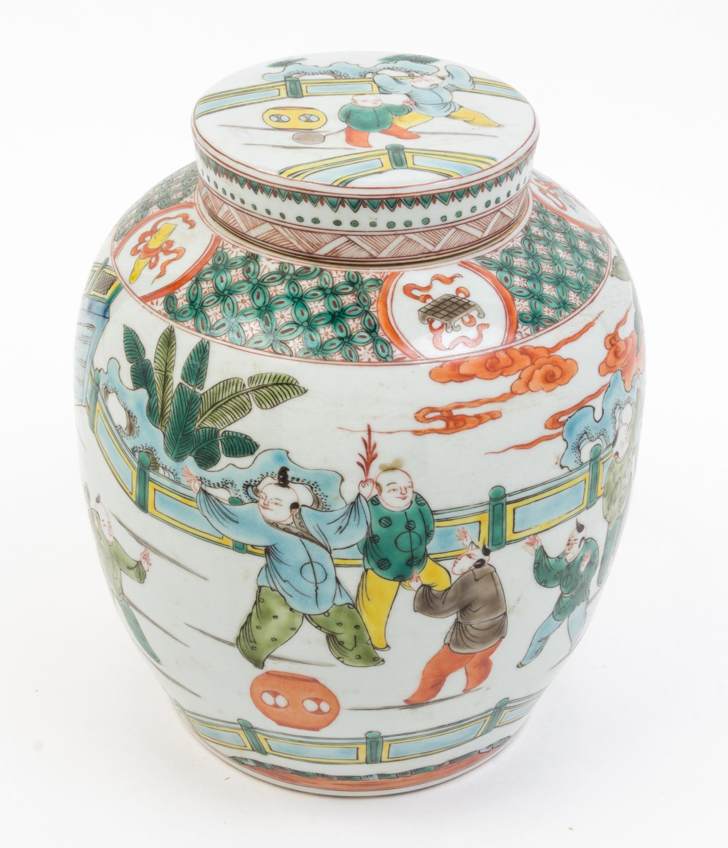 A Famille Verte Porcelain Jar and Cover Height 9 1/2 inches.