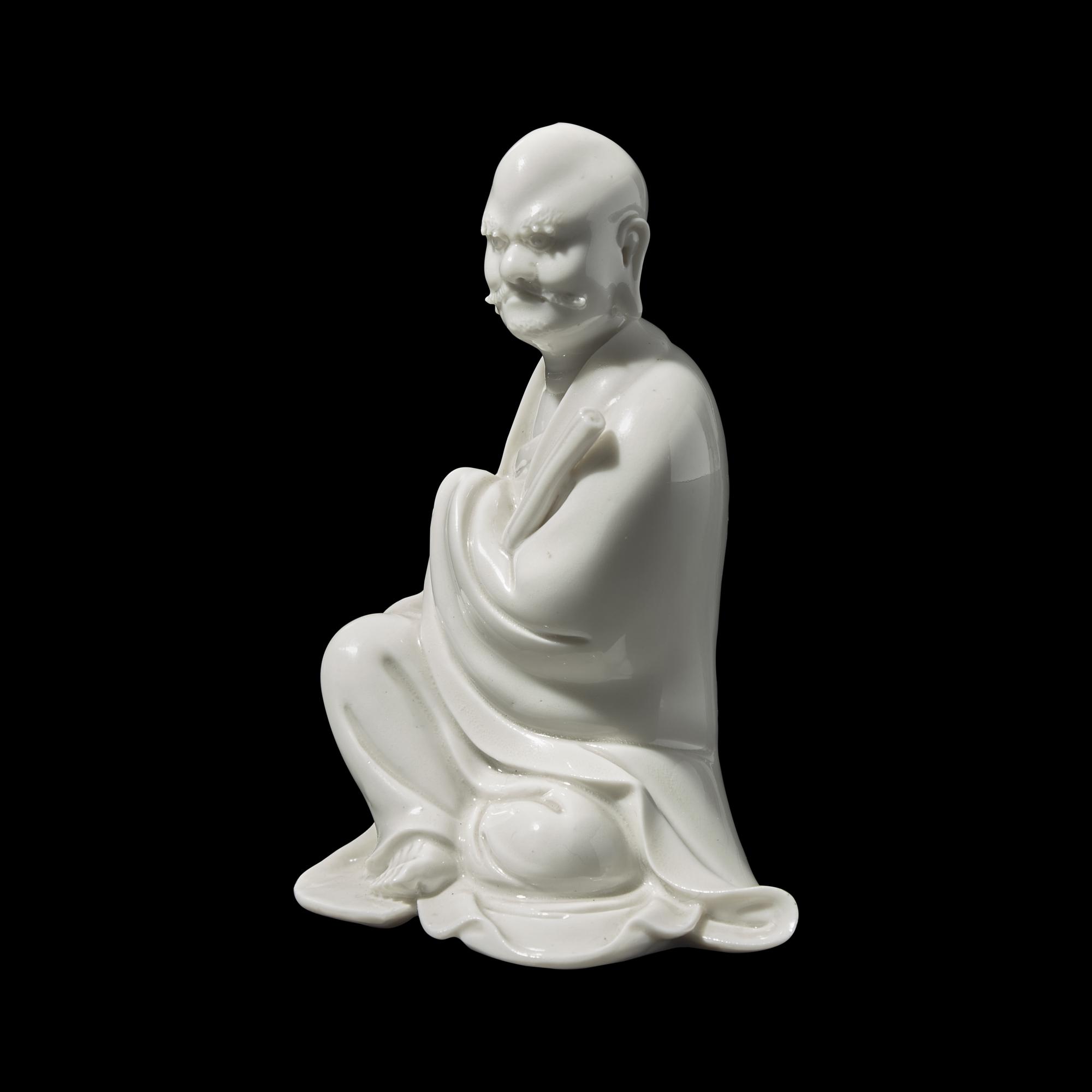 A Chinese Blanc de Chine Figure of Bodhidharma, Possibly 18th/19th Century 或爲清中期 德化白瓷達摩坐像