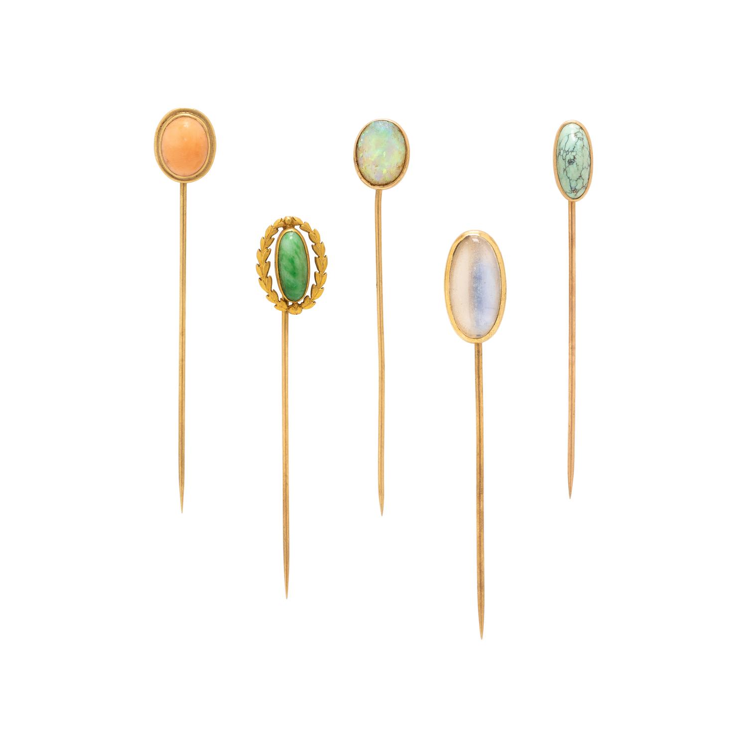 COLLECTION OF GOLD AND GEMSTONE STICK PINS