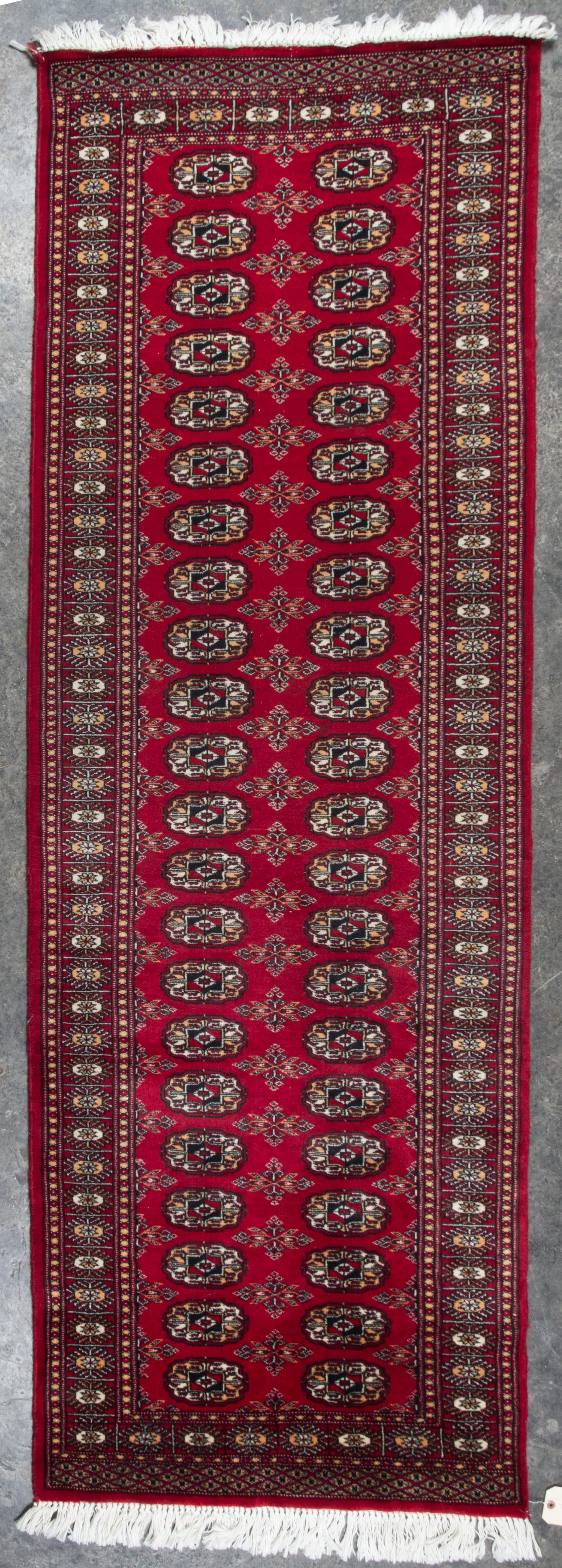 A Wool Runner 7 feet 9 inches x 2 feet 6 inches.