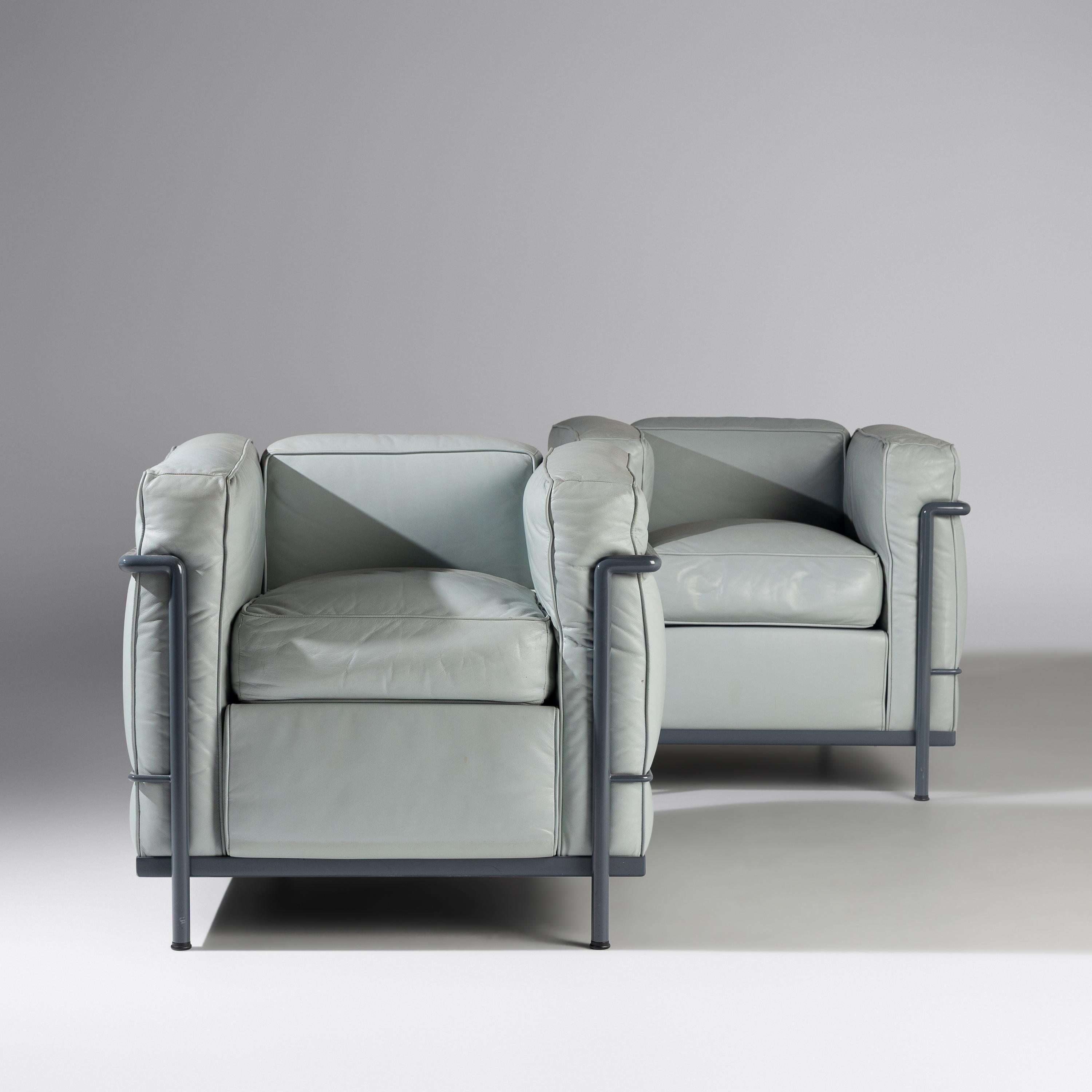 Charlotte Perriand, Pierre Jeanneret and Le Corbusier (French, 1903–1999 | Swiss, 1896-1967 | Swiss-French, 1887–1965) — Pair of LC2 chairs for Cassina