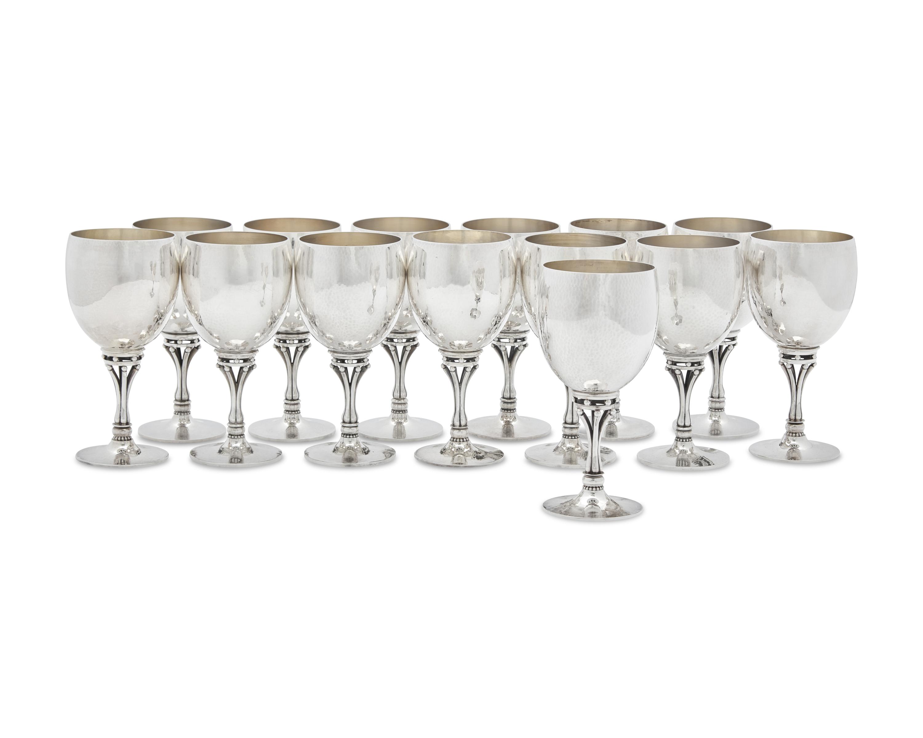 A Set of Fourteen Harald Nielsen Designed Georg Jensen Silver Goblets