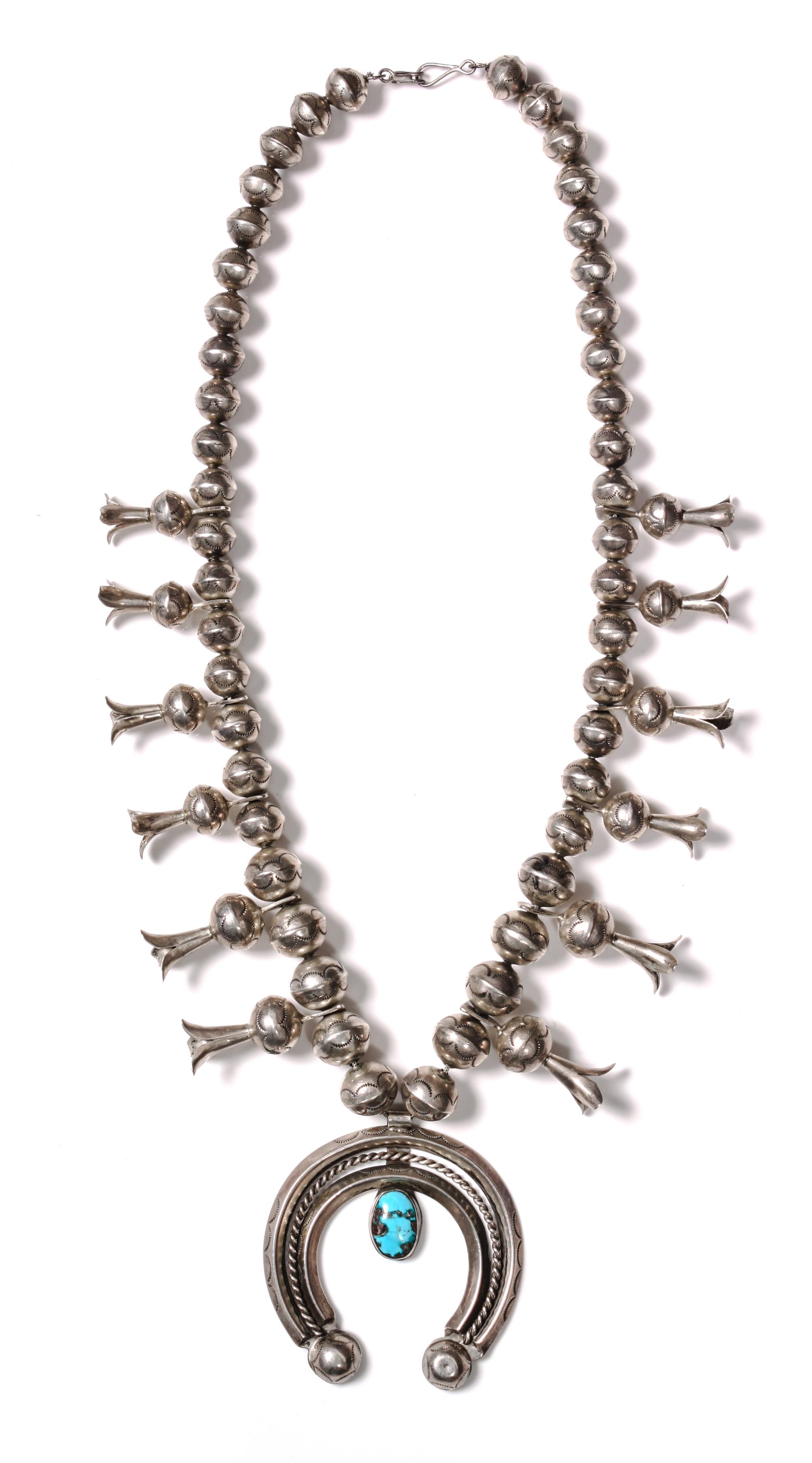 A Navajo Squash Blossom Necklace Length 24 inches; naja 2 3/4 inches.