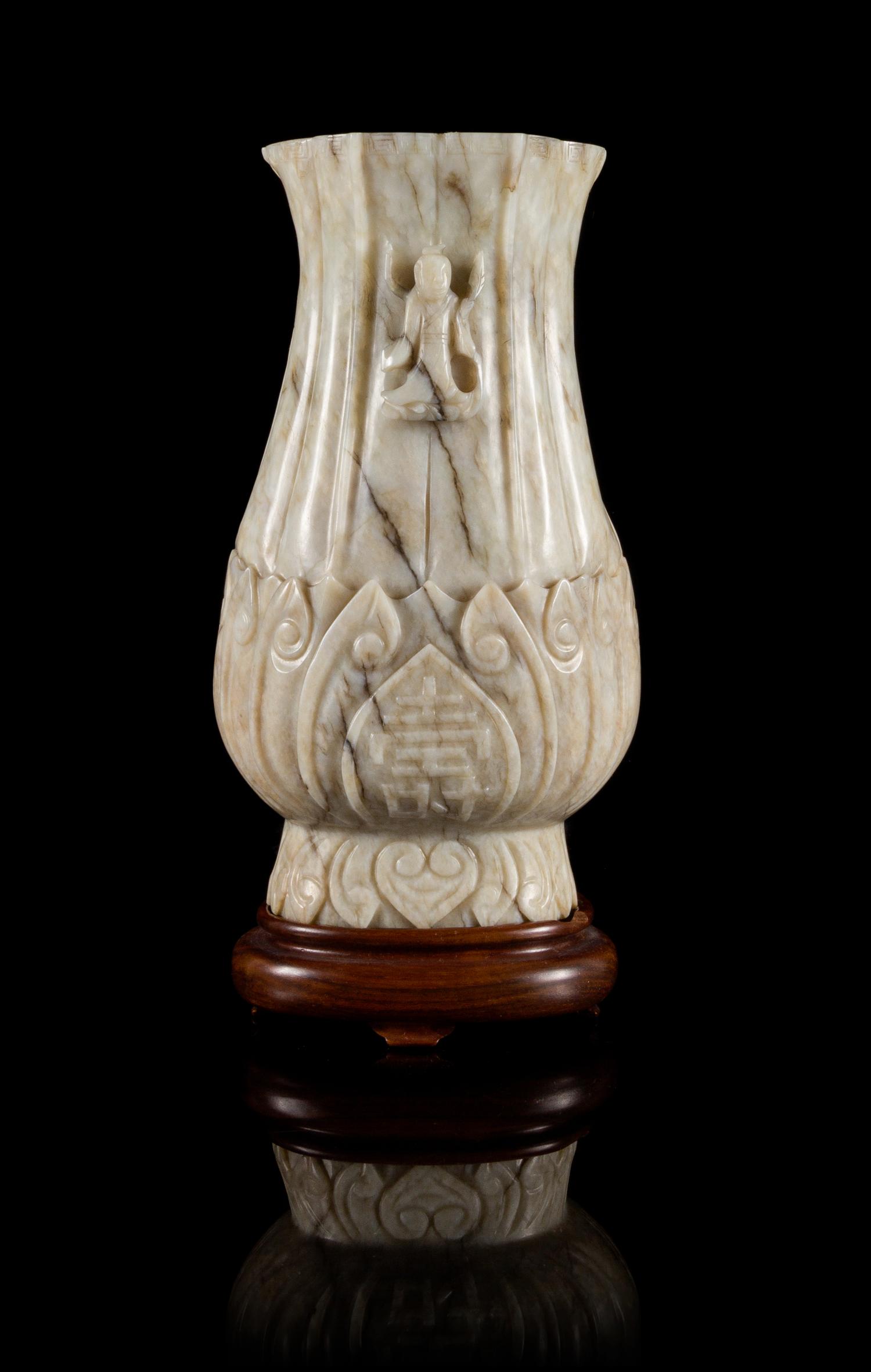 A Chicken Bone Jade Vase Height 8 inches.