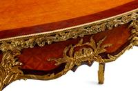 A Louis XV Style Parquetry and Gilt Bronze Mounted Bureau Plat