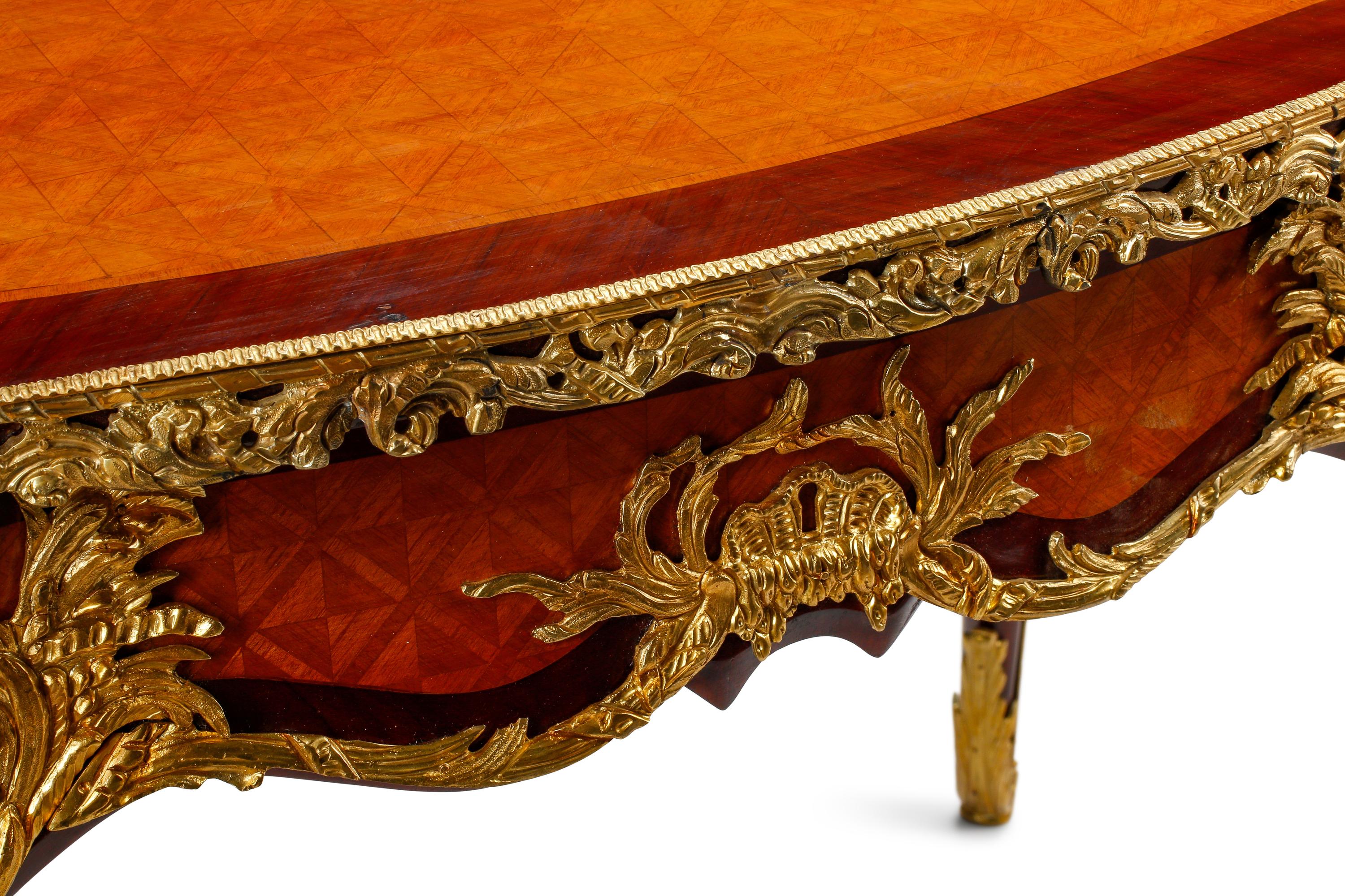 A Louis XV Style Parquetry and Gilt Bronze Mounted Bureau Plat