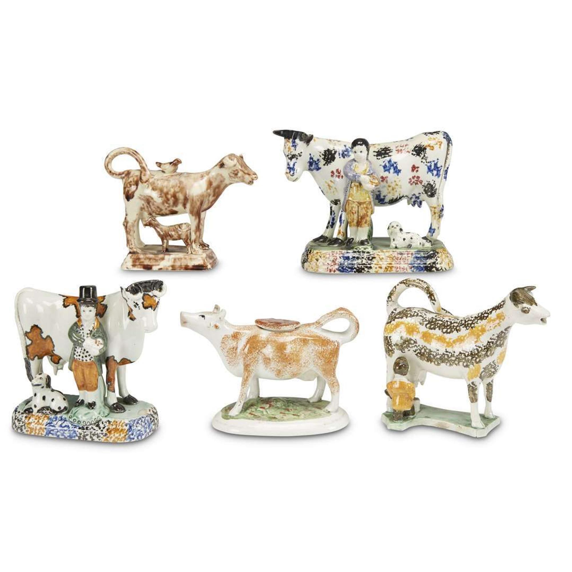 Assembled group of five pearlware and Prattware cow figures and creamers England, late 18th/early 19th century