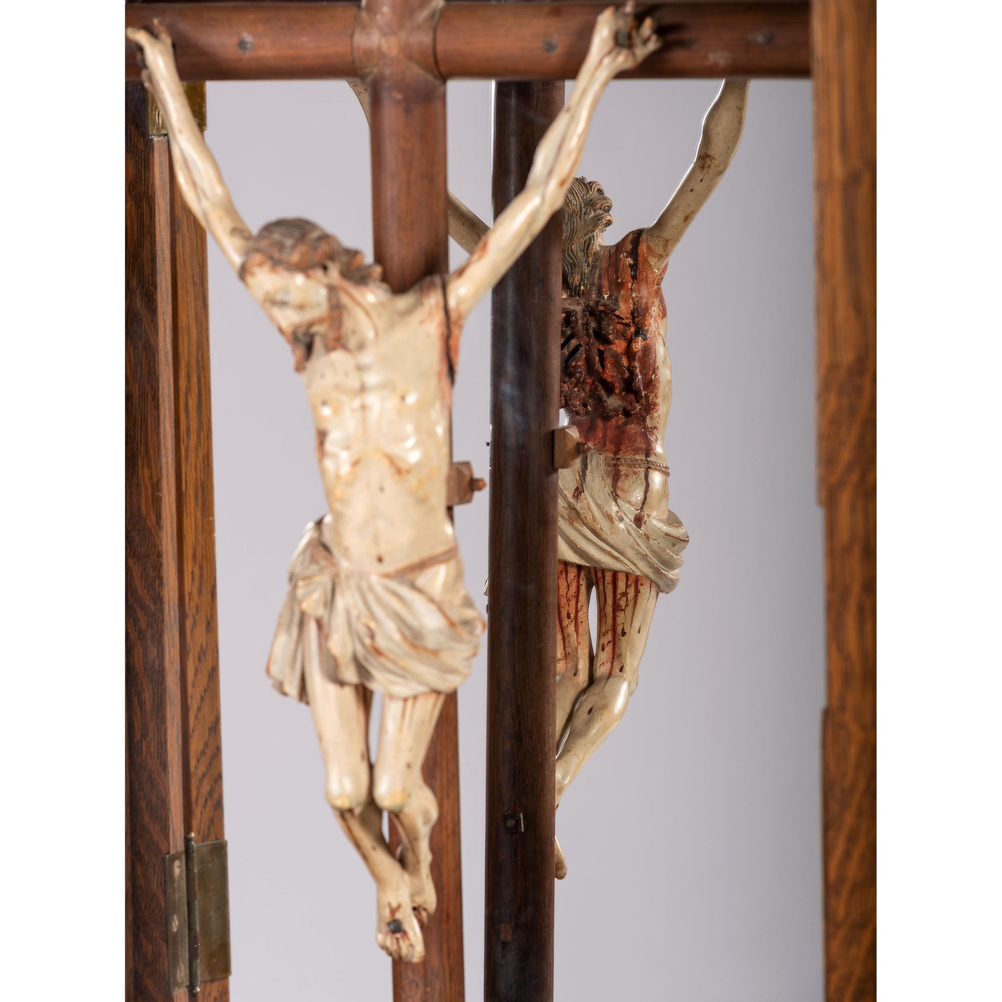A Spanish Colonial Carved and Painted Wood Crucifix