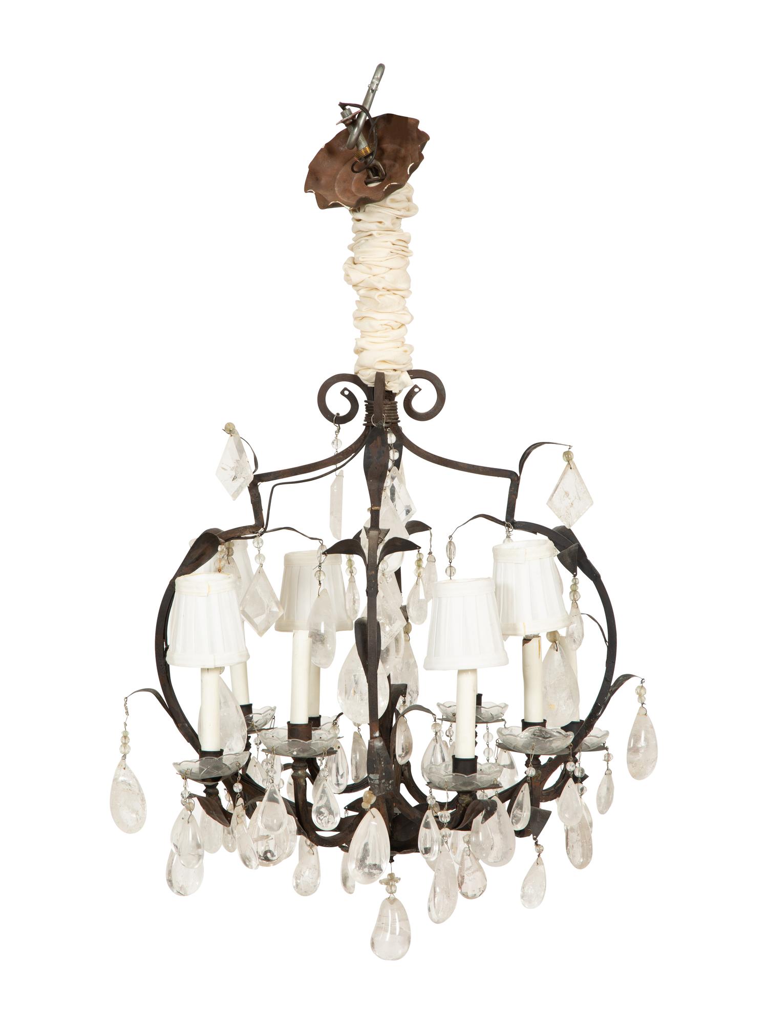 A Wrought Iron and Rock Crystal Eight-Light Chandelier