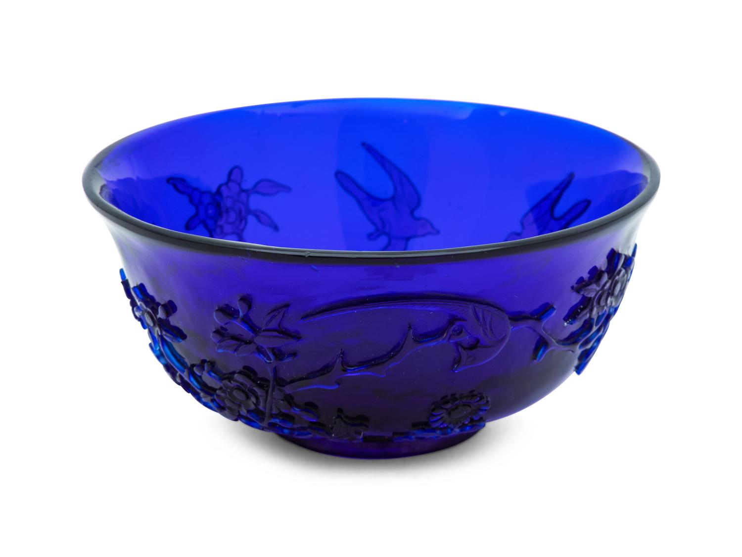 A Chinese Carved Transparent Blue Glass Bowl
