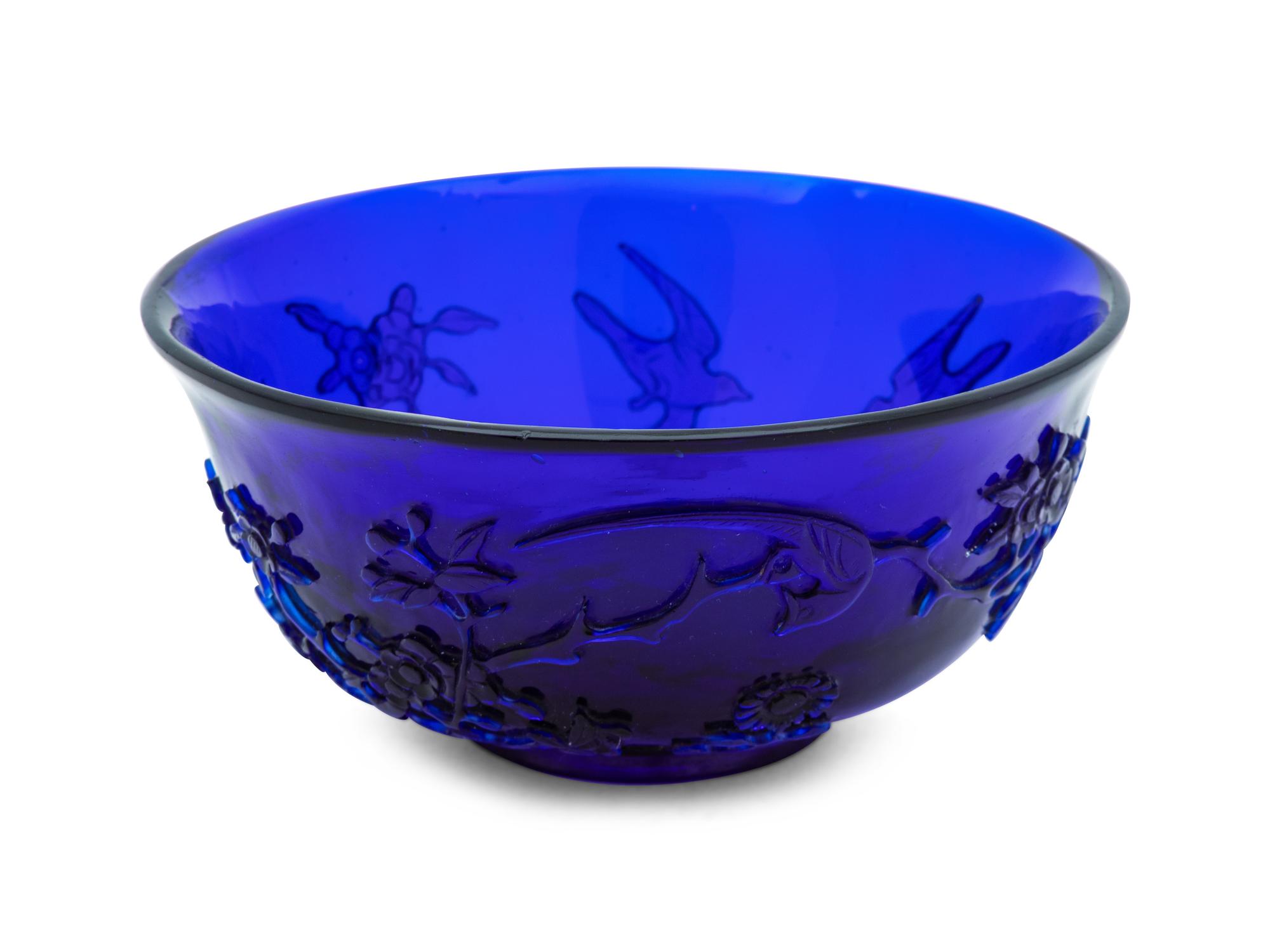 A Chinese Carved Transparent Blue Glass Bowl