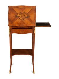 A Louis XV/XVI Transitional Gilt Bronze Mounted Marquetry Library Table