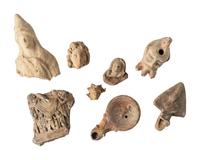 Ten Roman Terracotta Figures and Lamps