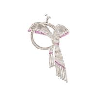 DIAMOND, RUBY, AND WHITE GOLD BOW PENDANT BROOCH