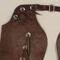 Two Pairs of Joseph Heinrich Framed Cowboy Chaps