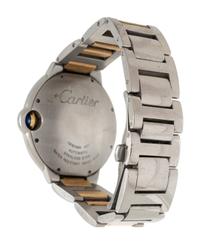 CARTIER, STAINLESS STEEL AND 18K YELLOW GOLD 'BALLON BLEU' WATCH