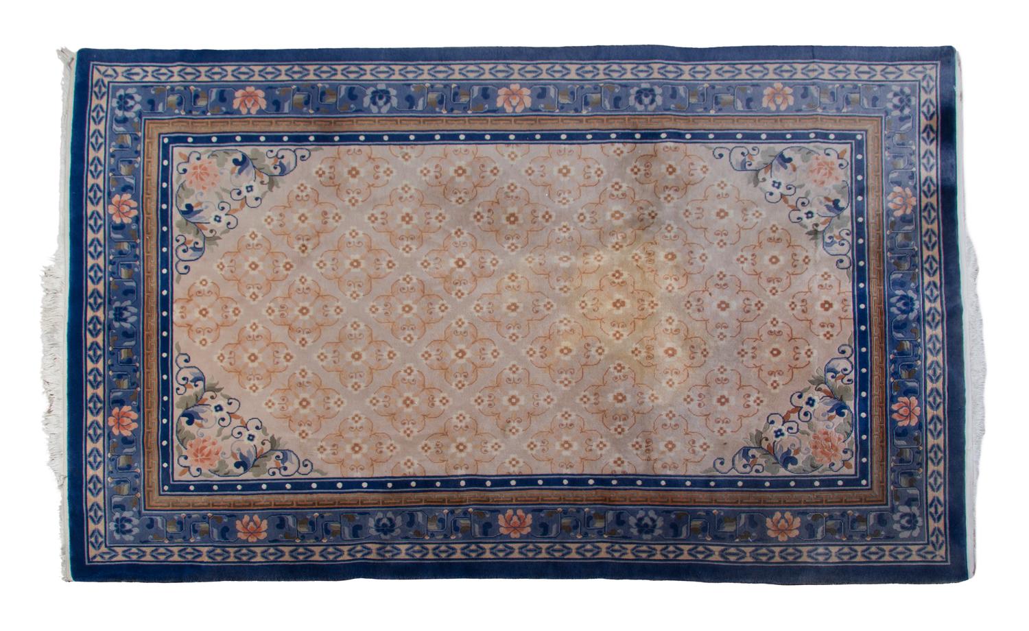 A Chinese Wool Rug, 9 feet 2 inches x 6 feet.