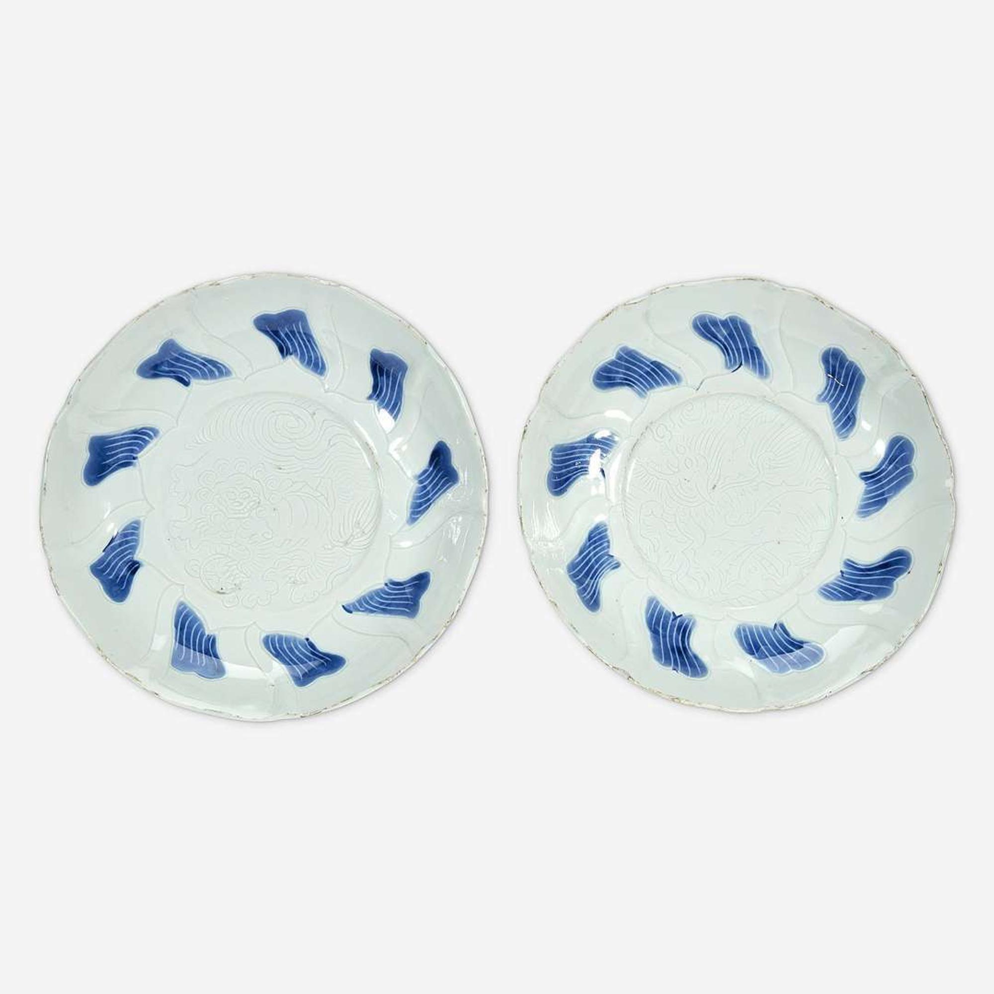 A pair of Chinese blue and white porcelain incised dishes Ming Dynasty