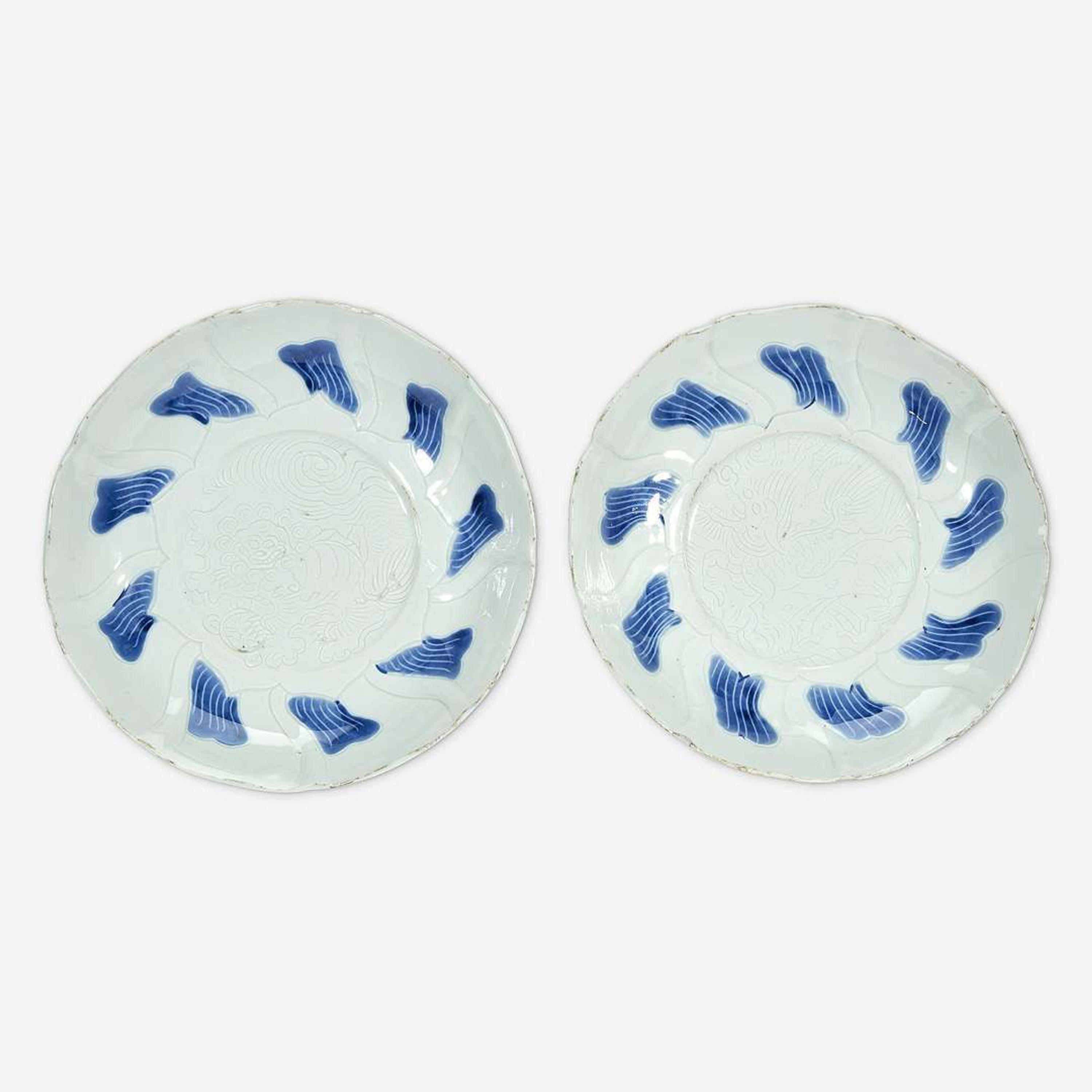 A pair of Chinese blue and white porcelain incised dishes Ming Dynasty