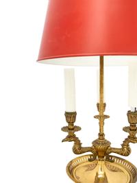 An Empire Style Brass Bouillotte Lamp with a Tole Shade