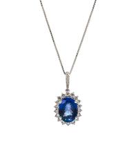 An 18 Karat White Gold, Tanzanite and Diamond Pendant, 4.70 dwts.